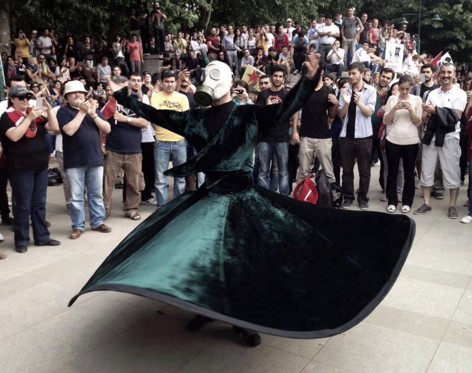 Whirling Sufi Protester wearing gas mask in a Gezi  Protest in Ankara, 2 June 2013