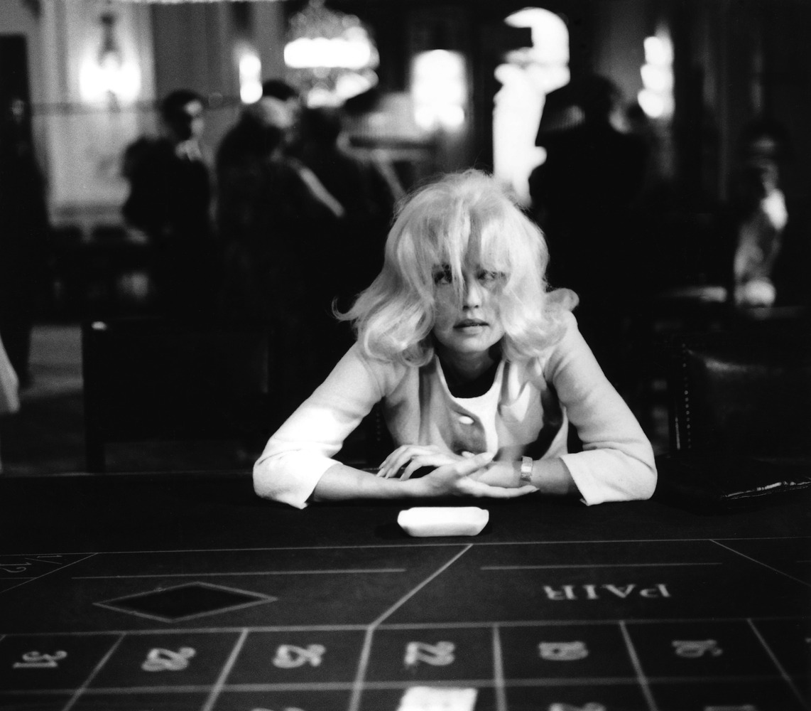 Jeanne Moreau at a betting table...