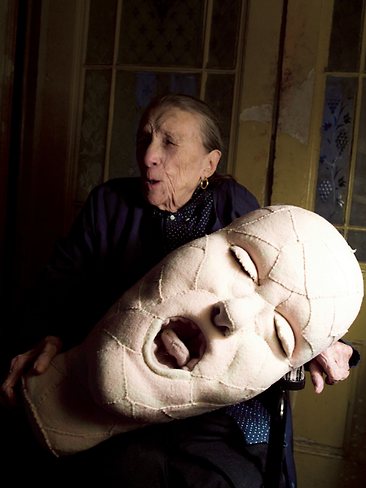 Louise Bourgeois with soft head sculpture, 2009.
